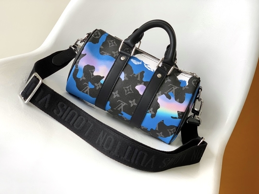 De Gemerkte Boodschapper Bag LV Keepall Bandoulière 25 van het zonsopgangmonogram Verduistering Zaal met een Weergeven