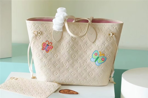 Partij Gemerkte Dameshandtas Neverfull MM. Monogram Empreinte met Bloeminlegwerk